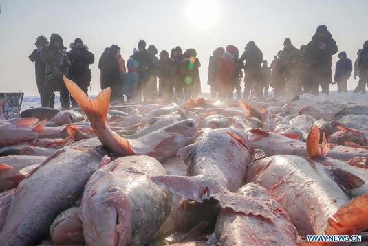 Winter fishing-themed tourist festival opens on ice-covered Chagan Lake